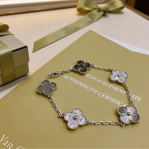 Van Cleef & Arpels Silver and Black Floral Bracelet